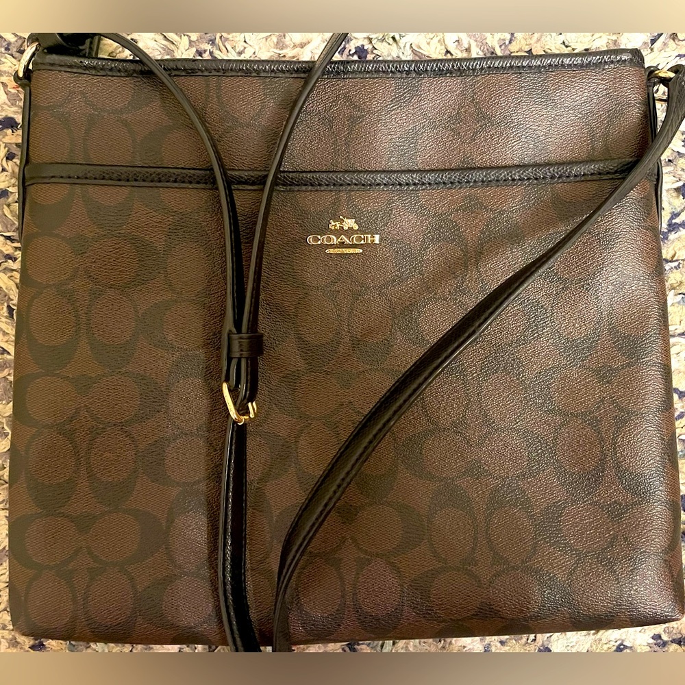 Original Coach messenger bag. Crossbody strap. Good condition. Brown/black color